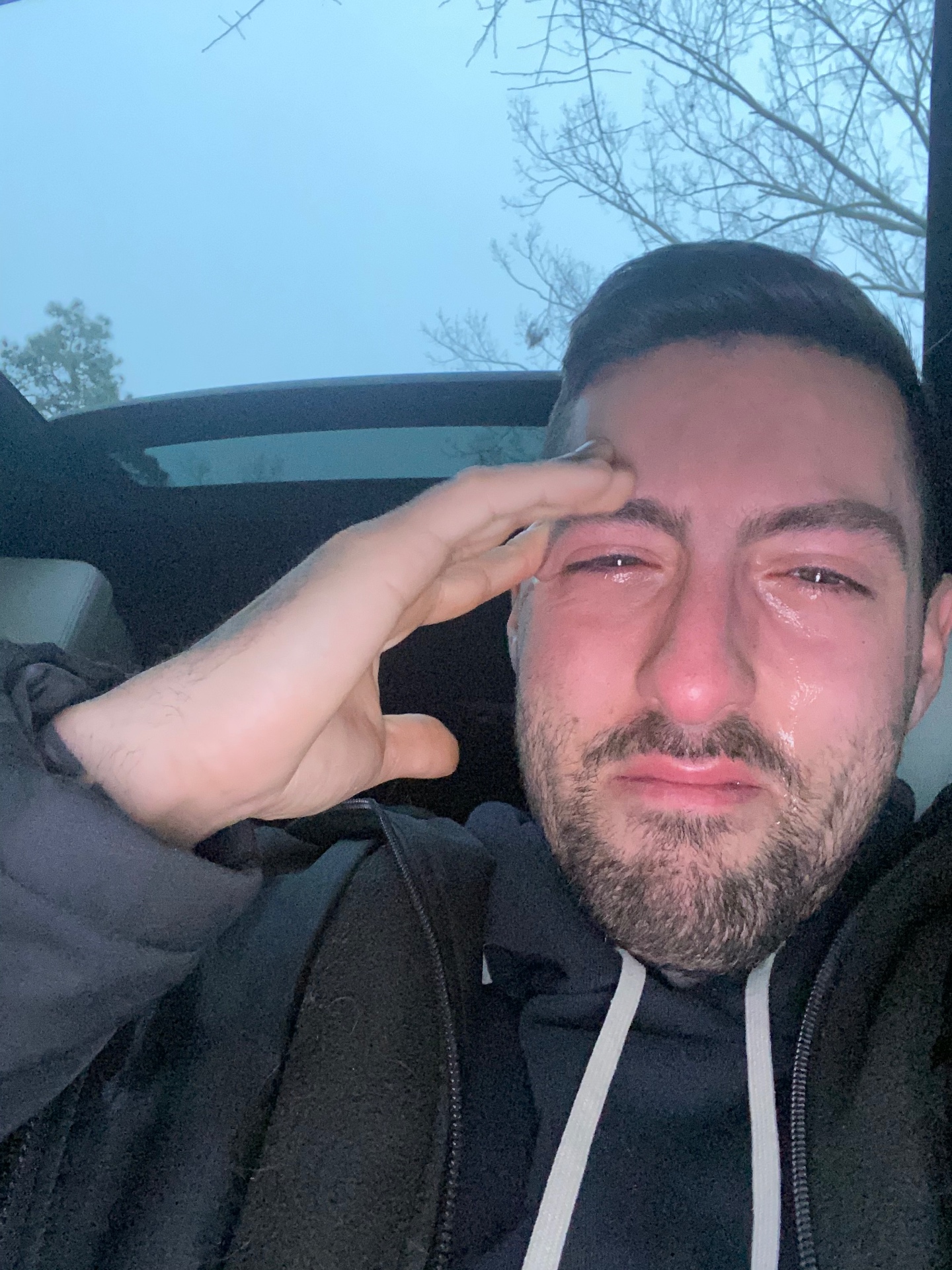 Dylan with tears, saluting himself